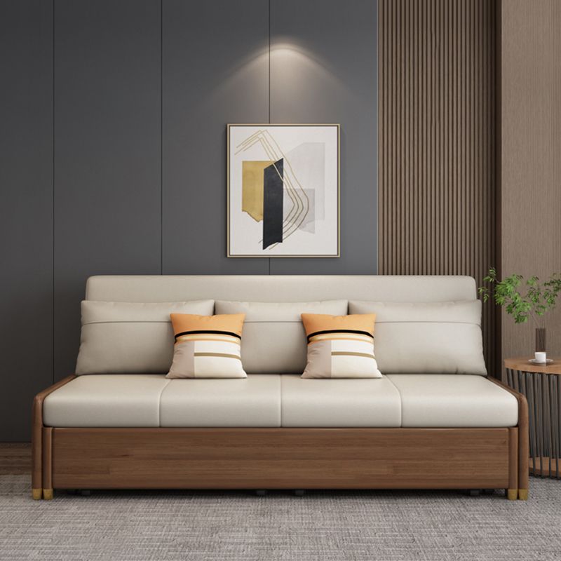 Canapé-lit beige et marron avec oreillers sièges convertibles avec rangement