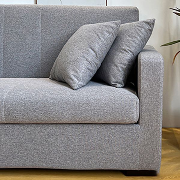 Salon contemporain biscuit arrière carré bras argent canapé stationnaire