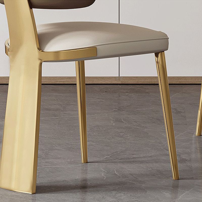 Glam -eetkamerstoel faux leer en metalen armloze eetkamerstoelen