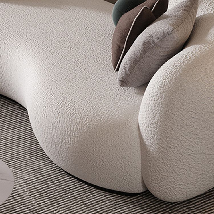リビングルームのための現代の白いウール湾曲したソファの傾斜腕ソファ
