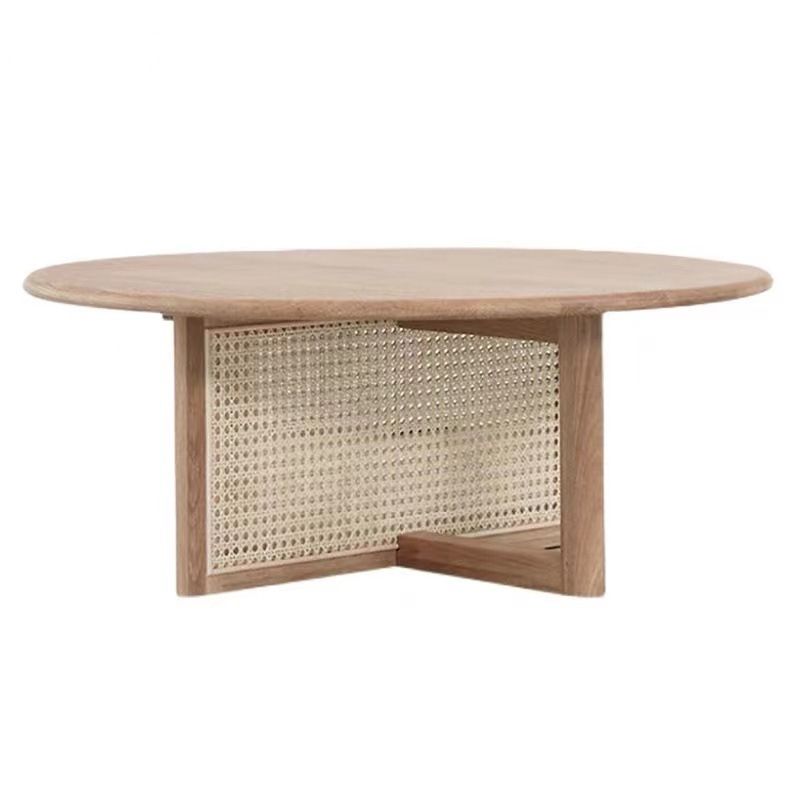Tavolino scandinavo rotondo con gambe incrociate in legno di pino