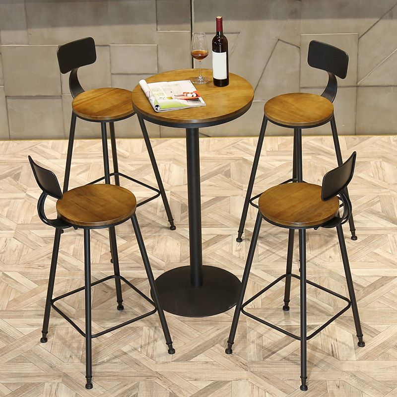 Industrieller Bistro-Stehtisch mit Sockel aus massivem Holz und Metall