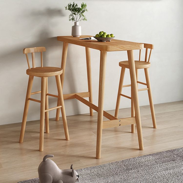 Modern Pine Wood Bar Dining Table Rectangle Indoor Bistro Table with Footrest Clearhalo 'Bar Furniture' 'Bar Tables' 'bar_tables' 'furn' 'furn_bar_tables' 'Furniture' 'furniture_bar_tables' 'Kitchen & Dining Furniture' 1200x1200_89952835-077c-406f-958d-8c8334ad0d58