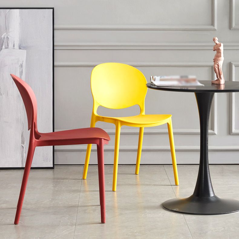 Scandinavian Armless Dining Chairs Plastic Indoor Stackable Open Back Side Chair Clearhalo ' kitchen&dining_furn' 'Dining Chairs' 'Dining Tables & Seating' 'dining_chair' 'furn' 'furn_dining_chair' 'Furniture' 'furniture_dining_chair' 'Kitchen & Dining Furniture' 'kitchen' 1200x1200_8a3d2e68-13e3-414d-b7ca-072d778b7e0a