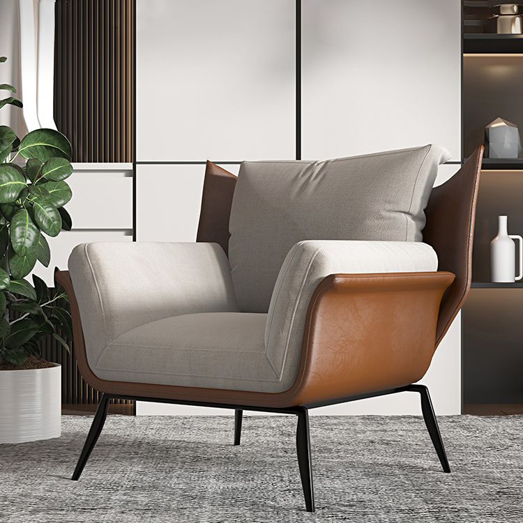 Contemporary Fabric Armrest Cushioned Against Brown Arm Chair