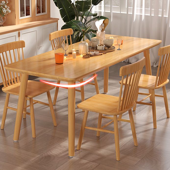 Mesa de comedor rectangular de madera maciza de pino con patas con acabado natural
