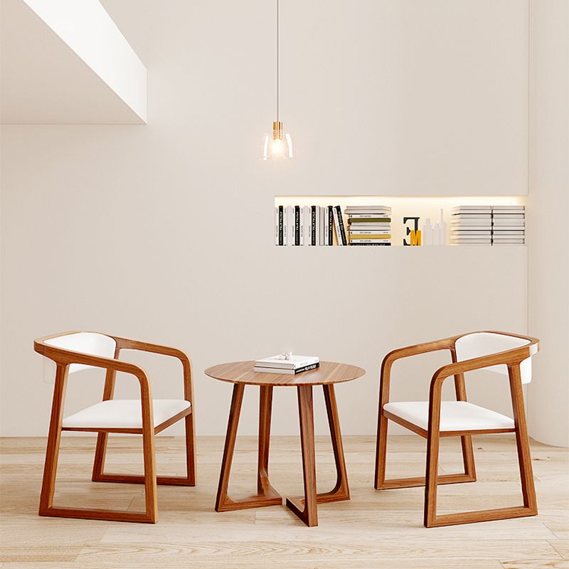 Tavolino a base di gambe incrociate in legno massiccio con cima rotonda