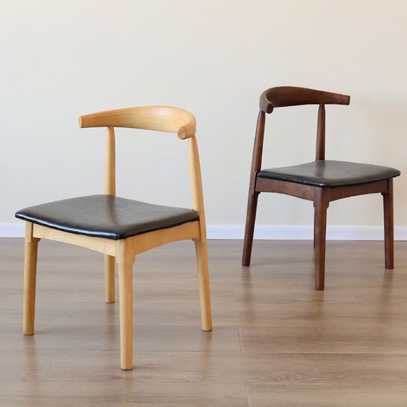 Sillas de comedor de cuero PU Diseño industrial Silla de comedor de espalda abierta