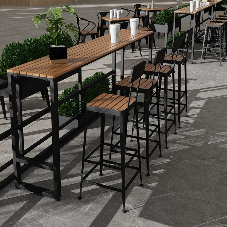 Modern Style Brown Bar Table Pine Wood and Iron Outdoor Bar Table Clearhalo 'Bar Furniture' 'Bar Tables' 'bar_tables' 'furn' 'furn_bar_tables' 'Furniture' 'furniture_bar_tables' 'Kitchen & Dining Furniture' 'kitchen&dining_furn' 'kitchen' 1200x1200_8ee5167e-5bd7-4dae-9d12-de3cc7ec93bb