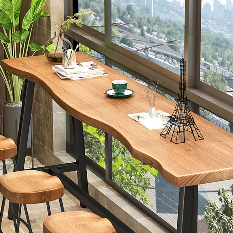 Brown Modern Style Table Solid Wood and Iron Balcony Bar Table Clearhalo 'Bar Furniture' 'Bar Tables' 'bar_tables' 'furn' 'furn_bar_tables' 'Furniture' 'furniture_bar_tables' 'Kitchen & Dining Furniture' 1200x1200_8f2092b4-8b78-4f4e-a127-a1d38f35484d