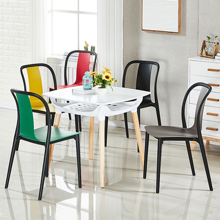 Scandinavian Armless Dining Chairs Plastic Slat Back Side Chairs with Black Legs Clearhalo ' kitchen&dining_furn' 'Dining Chairs' 'Dining Tables & Seating' 'dining_chair' 'Furniture' 'furniture_dining_chair' 'Kitchen & Dining Furniture' 'kitchen' 1200x1200_8f2b9eb2-b6ef-4815-a87b-77f437e6ccca