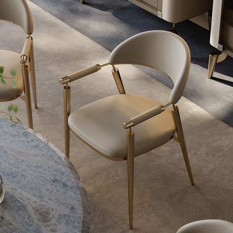 Silla de brazo estilo glam silla de comedor de metal abierta para la cocina