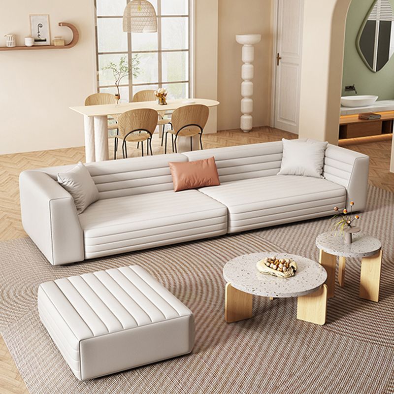 白い現代標準のタイトな背面腕ソファソファ