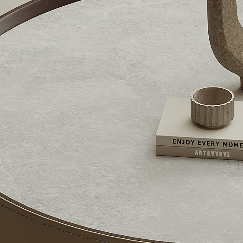 Eigentijdse salontafel rond 3 poten leistenen koffiecocktailtafel
