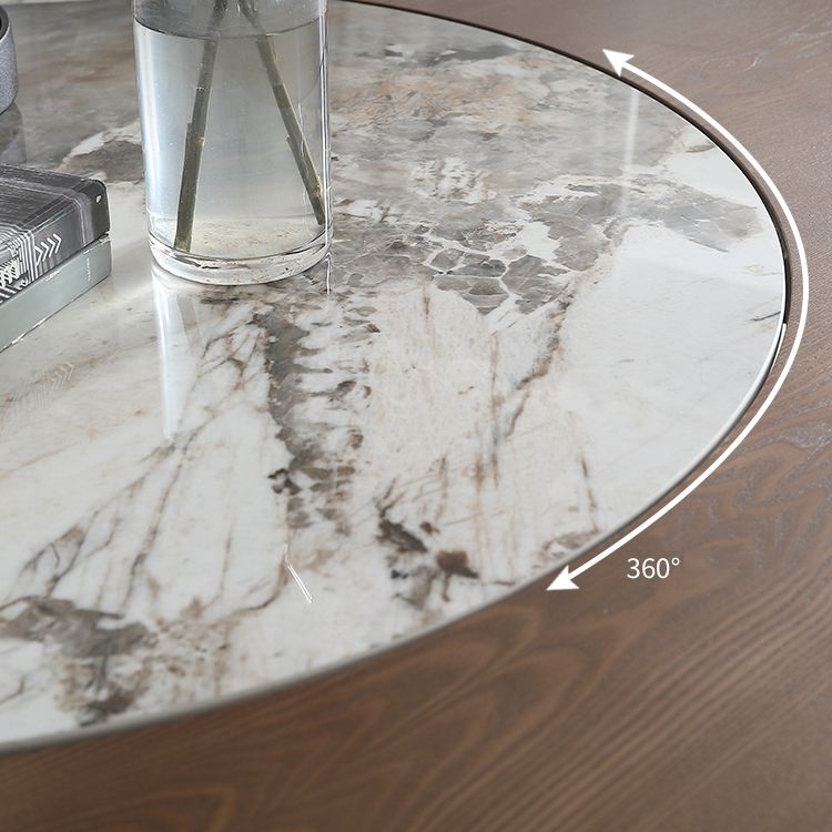 Eigentijdse ronde eettafel bruine as houten voetstuktafel