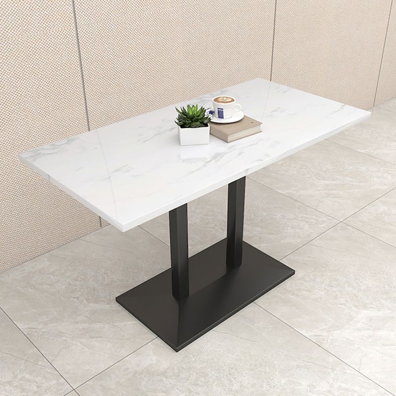 Mesa de comedor de piedra geométrica moderna con base metálica para comedor