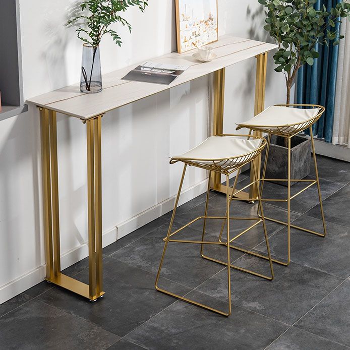 Evento di slitta da rettangolo interno e tavolo da cocktail glam in pietra e tavolino in metallo