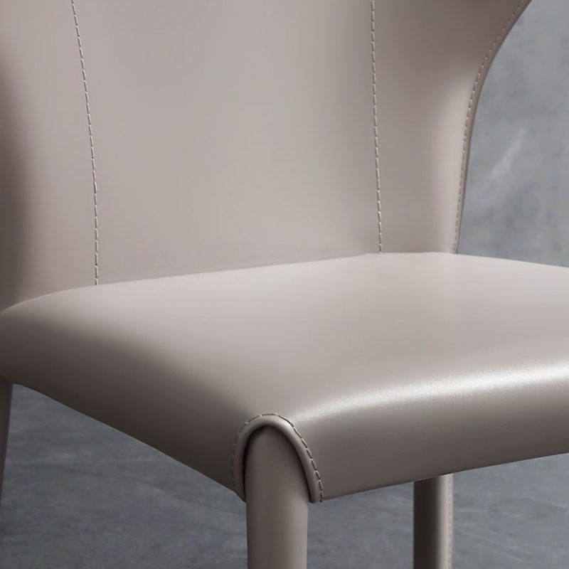 Eigentijdse lederen eetkamer stoel armloze wingback zijstoelen voor thuisgebruik