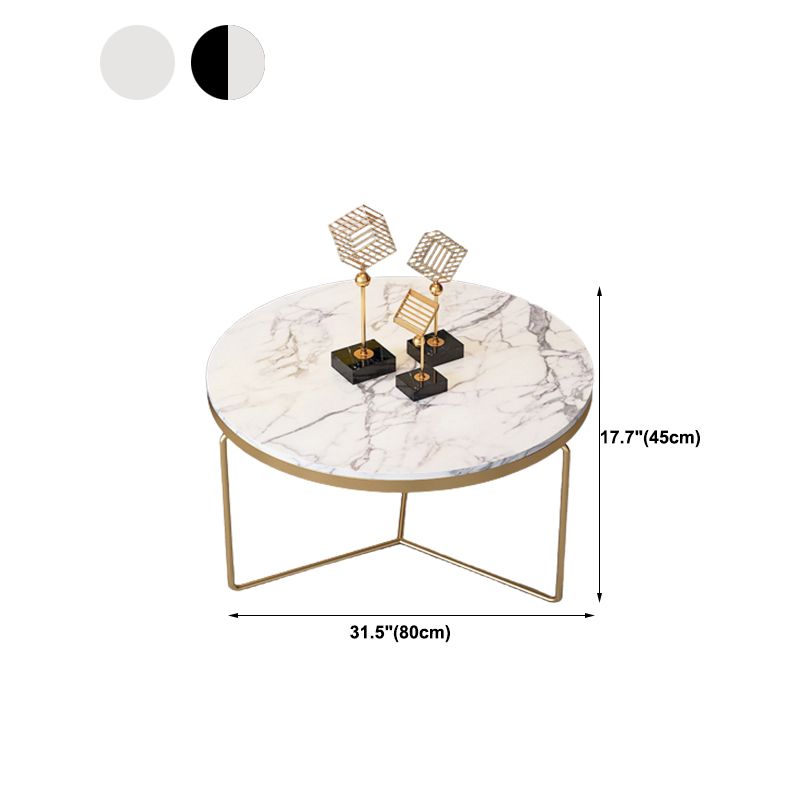 Runder Couchtisch mit goldener Eisen-X-Base und Marmorplatte
