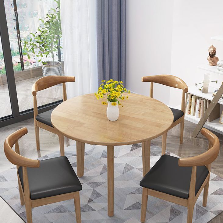 Round Shape 4 Legs Modern Dining Table Wood Color Fixed Table of Solid Wood Clearhalo ' dining_table' 'Dining Tables & Seating' 'Dining Tables' 'furn' 'furn_dining_table' 'Furniture' 'furniture_dining_table' 'Kitchen & Dining Furniture' 'kitchen&dining_furn' 'kitchen' 'kitchen_dining_table' 1200x1200_94978b8f-eaeb-453c-8a5e-2e9276c7bc75