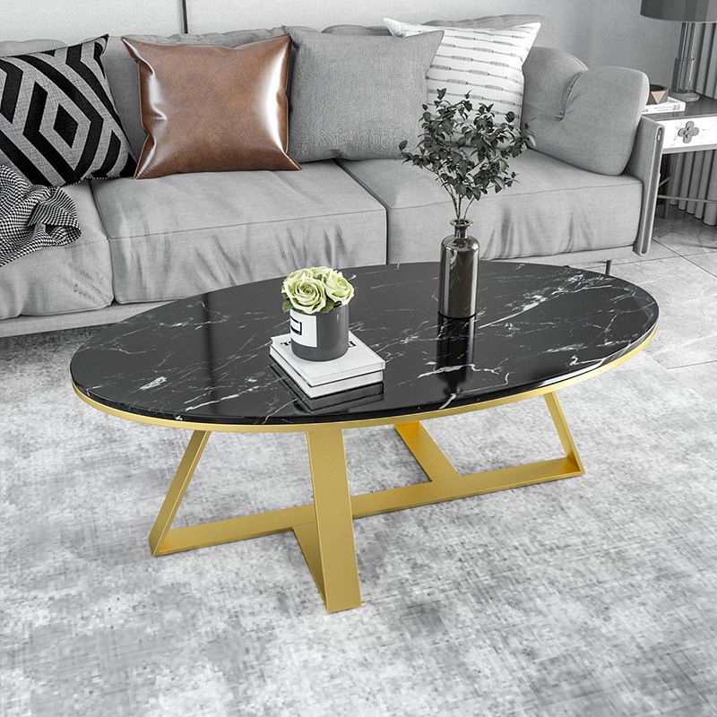 Oval Coffee Table with a Black/gold Base Made of Marble and Wrought Iron Clearhalo 'Coffee & Accent Tables' 'Coffee Tables' 'coffee_tables' 'furn' 'furn_coffee_tables' 'Furniture' 'Living Room Furniture' 1200x1200_94f89c7d-3eb8-4a68-b6d7-de65f54cd947