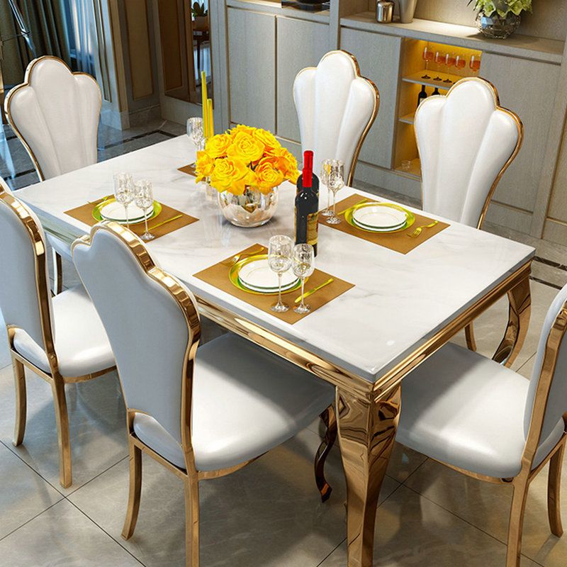 Luxe eettafel met gouden onderstel, keukentafel van imitatiemarmer