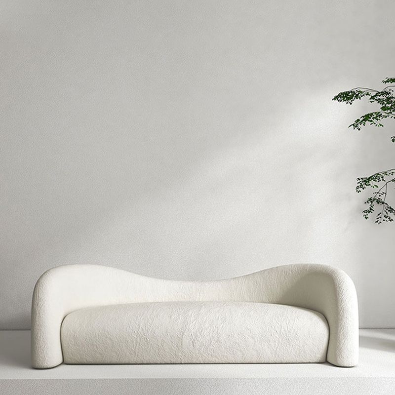 リビングルームのためにタイトな背中を持つ現代の湾曲したソファの傾斜腕ソファ