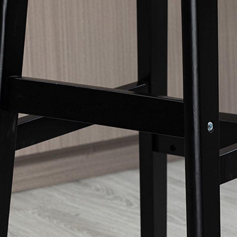 Sgabelli da bar imbottiti da bar in legno solido industriale con gambe nere