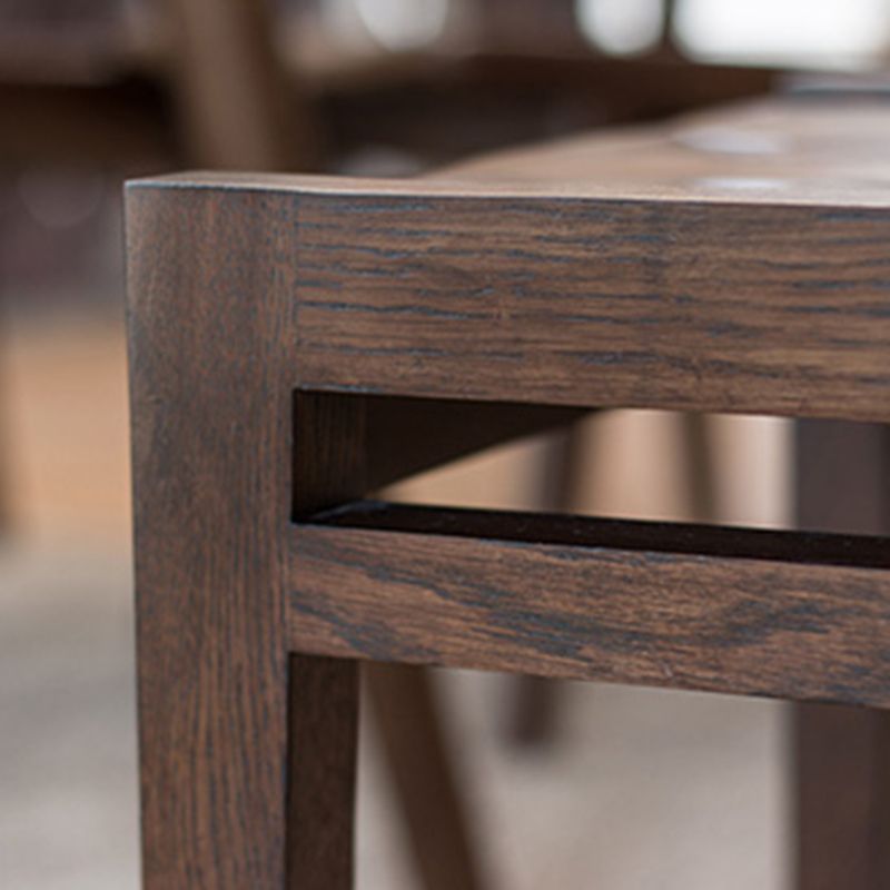 コンテンポラリースタイルのダイニングチェアオープンバックダイニングアームレスサイド椅子と木製の脚