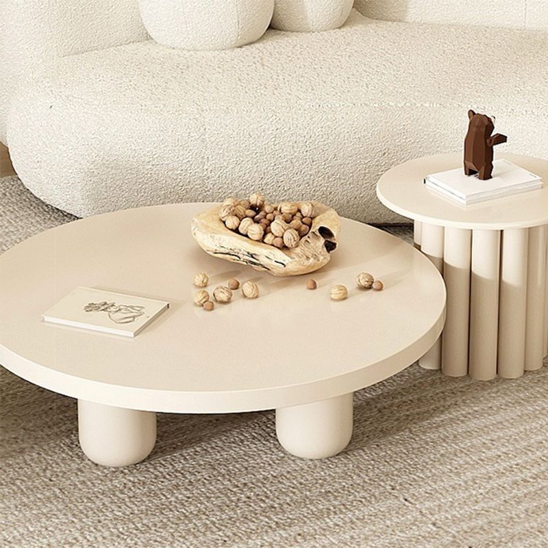 Mesa de centro individual redonda de madera maciza con pedestal contemporáneo/4 patas