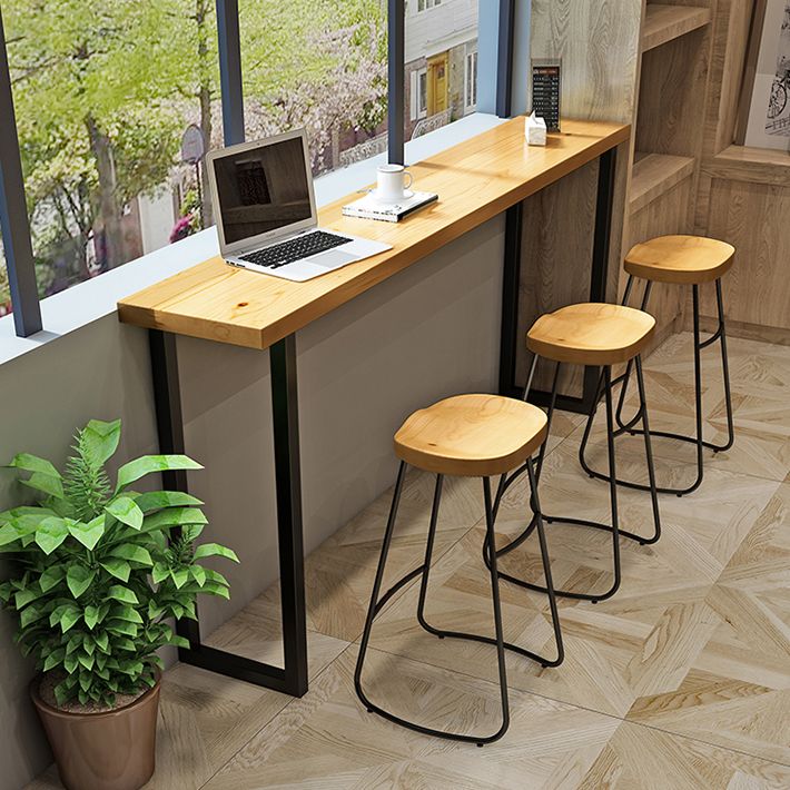 Modern Armless Backless Counter Stool Iron Cafe Bar Stool with Wooden Seat and Pedal Clearhalo 'Bar Furniture' 'Bar Stools' 'bar_stools' 'furn' 'furn_bar_stools' 'Furniture' 'furniture_bar_stools' 'Kitchen & Dining Furniture' 1200x1200_9811a014-dd43-48b7-9b0f-ff41e9c9a10c