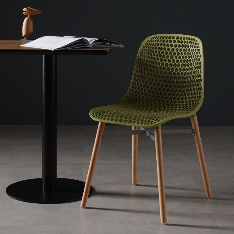 Scandinavian Style Plastic Dining Armless Chair Solid Back Chair with Wooden Legs Clearhalo ' kitchen&dining_furn' 'Dining Chairs' 'Dining Tables & Seating' 'dining_chair' 'furn' 'furn_dining_chair' 'Furniture' 'furniture_dining_chair' 'Kitchen & Dining Furniture' 'kitchen' 1200x1200_9872e91f-3690-488d-8554-5e62e51bf1d3