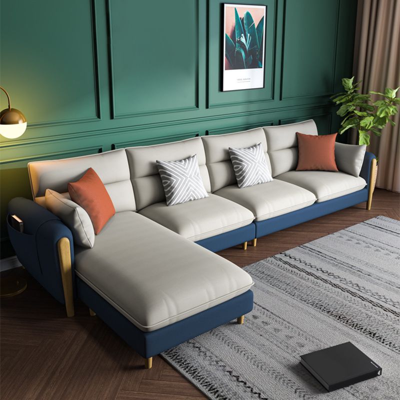 Divano sezionale del braccio rotondo con ottoman sezionale in pelle finta