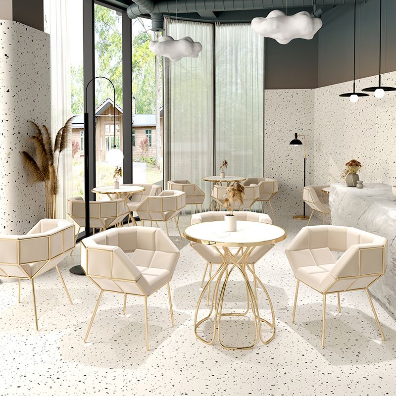 Mesa redonda de piedra para la mesa de comedor de lujo con base de metal