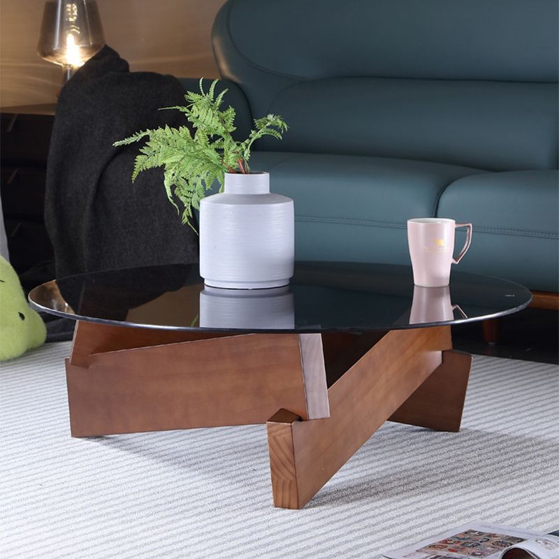 Tavolo da cocktail tondo in vetro con base in legno massiccio