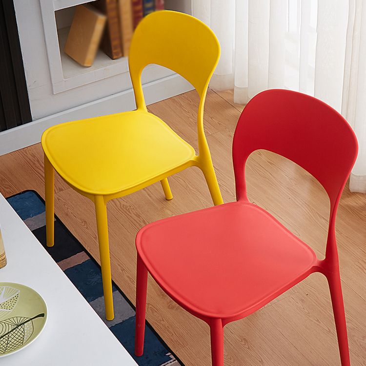 Contemporary Plastic Dining Room Chairs Armless Open Back Dining Side Chair for Room Use Clearhalo ' kitchen&dining_furn' 'Dining Chairs' 'Dining Tables & Seating' 'dining_chair' 'furn' 'furn_dining_chair' 'Furniture' 'furniture_dining_chair' 'Kitchen & Dining Furniture' 'kitchen' 1200x1200_99744450-d72f-4aae-9b89-21dbe7d4433d
