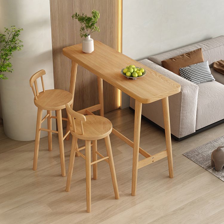 Modern Pine Wood Bar Dining Table Rectangle Indoor Bistro Table with Footrest Clearhalo 'Bar Furniture' 'Bar Tables' 'bar_tables' 'furn' 'furn_bar_tables' 'Furniture' 'furniture_bar_tables' 'Kitchen & Dining Furniture' 1200x1200_9ae05286-fa2c-42b3-9871-a31cabcaf144