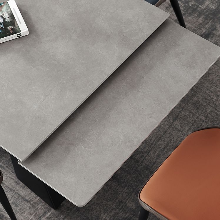 Table de salle à manger rectangulaire, plateau moderne en pierre grise avec base en métal noir