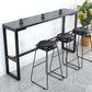 Bistrotisch im Industriestil mit Steinplatte und Metallsockel
