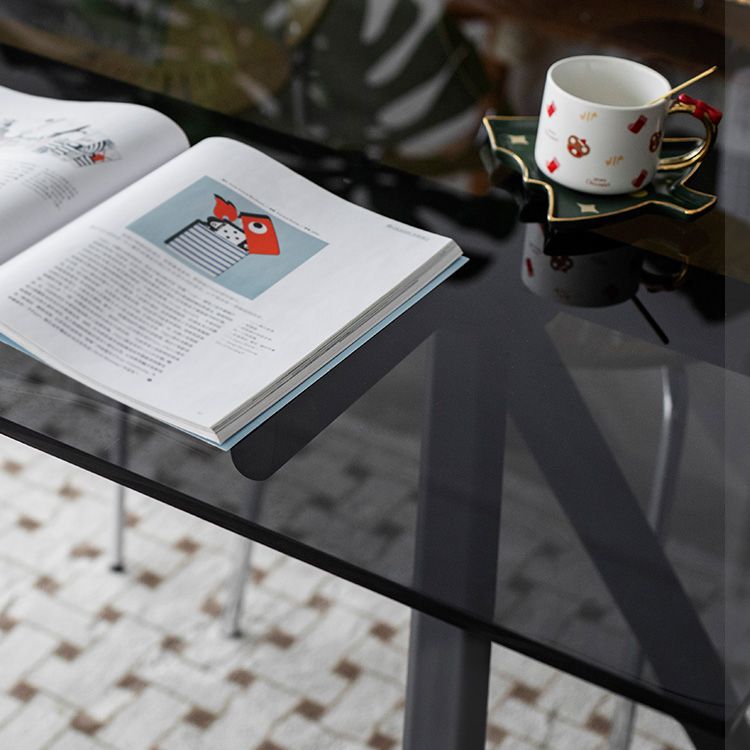 Tavolo da pranzo rettangolare in vetro rettangolare contemporaneo con gambe in acciaio