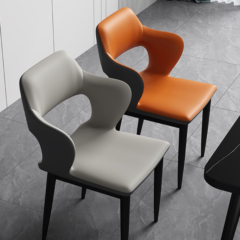 Sedia laterale aperta moderna in pelle imbottita sedia da pranzo senza braccio con base in metallo