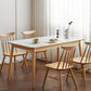 Moderne massief houten poten eettafel met rechthoekig stenen blad