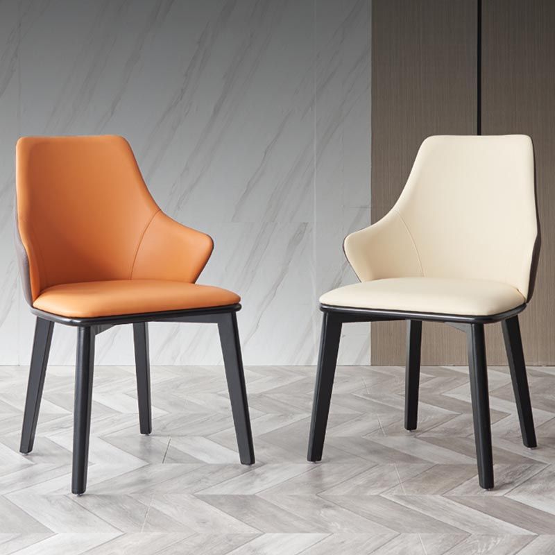 Glam Wingback Arm stoel lederen eetkamerstoel met donkere as massief houten benen