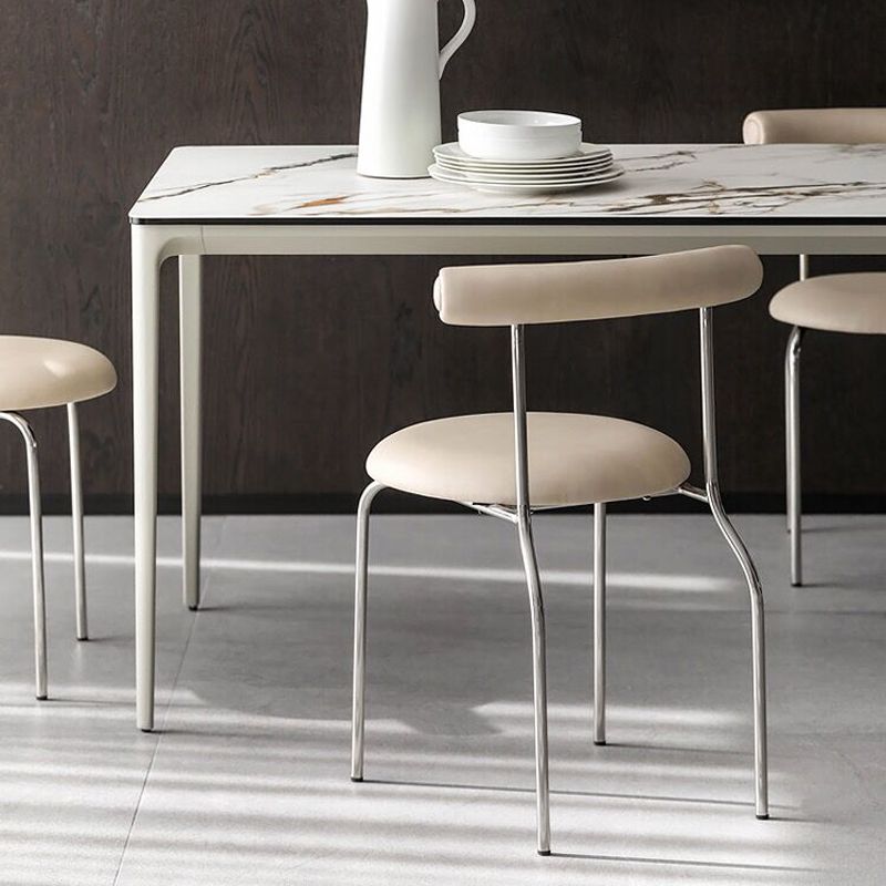 Zilveren metalen benen armloze eetkamerstoelen moderne faux lederen eetkamerstoel