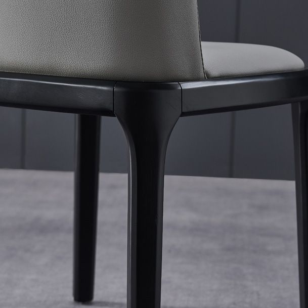 工業用アームレスダイニングチェアソリッドウッドの脚布張りのサイドチェア