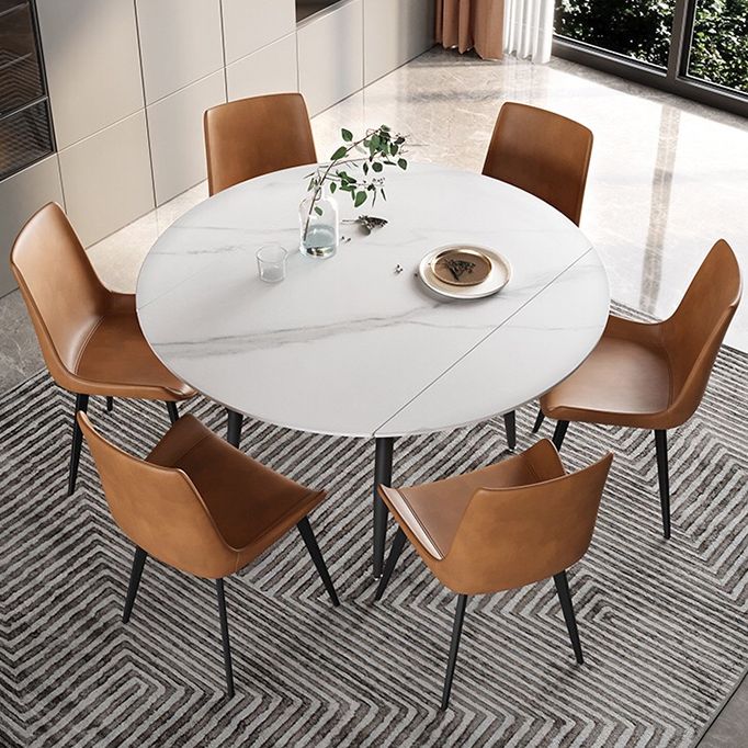 53.15''L Round Contemporary Dining Table Sintered Stone Table with 4 Black Metal Legs Clearhalo ' dining_table' 'Dining Tables & Seating' 'Dining Tables' 'furn' 'furn_dining_table' 'Furniture' 'furniture_dining_table' 'Kitchen & Dining Furniture' 'kitchen&dining_furn' 'kitchen' 'kitchen_dining_table' 1200x1200_9ebaf317-40c5-4be6-b668-9ea434dd17ba