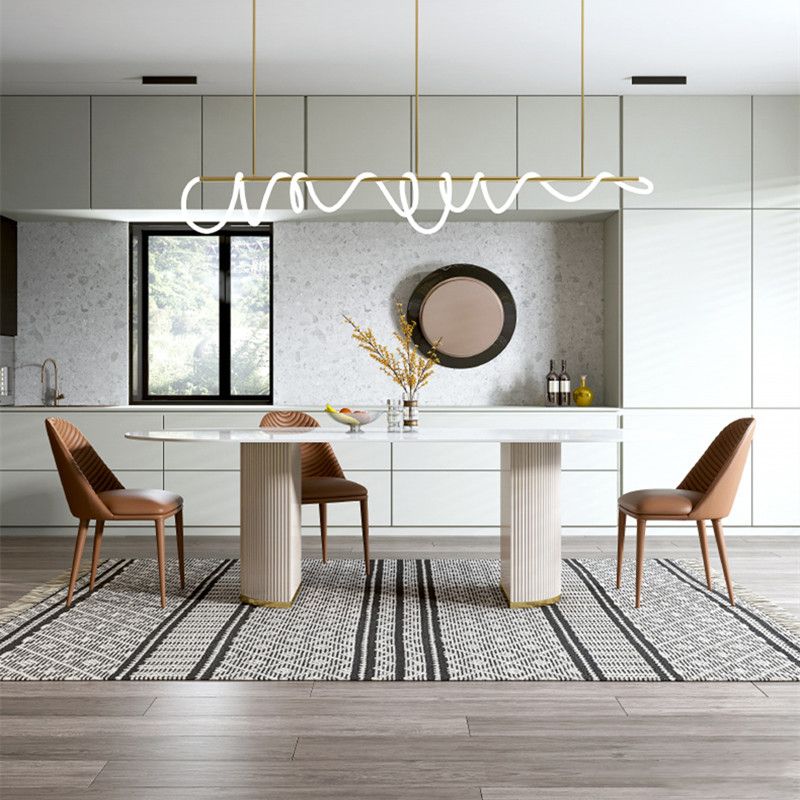 Luxe ovale eettafel Stenen eettafel met dubbel voetstuk