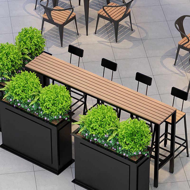 Manufactured Wood Bar Table Black Legs and Metal Base Bar Table Clearhalo 'Bar Furniture' 'Bar Tables' 'bar_tables' 'furn' 'furn_bar_tables' 'Furniture' 'Kitchen & Dining Furniture' 1200x1200_9f118a72-e59f-4007-8321-ab5be33f46be