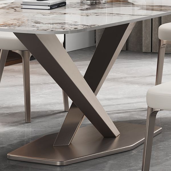 Mesa de comedor de piedra rectangular de lujo con acero dorado X-base