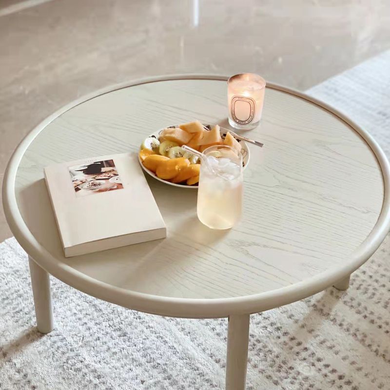 Contemporary Cream Round Coffee Table Solid Wood 1 Single Cocktail Table Clearhalo 'Coffee & Accent Tables' 'Coffee Tables' 'coffee_tables' 'furn' 'furn_coffee_tables' 'Furniture' 'Living Room Furniture' 1200x1200_9fbc60e5-3e8f-4d79-9a19-0a8e8079c53b